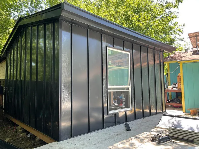 Black standing seam metal wall panels for Roof Inspection in Bethesda