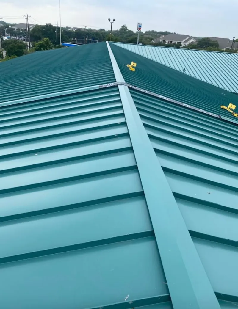 Green commercial metal roof ridge and valley for Metal Roof Repair in Bethesda